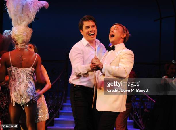 Simon Burke and John Barrowman attend the press night for La Cage Aux Folles at the Playhouse Theatre on October 5, 2009 in London, England.