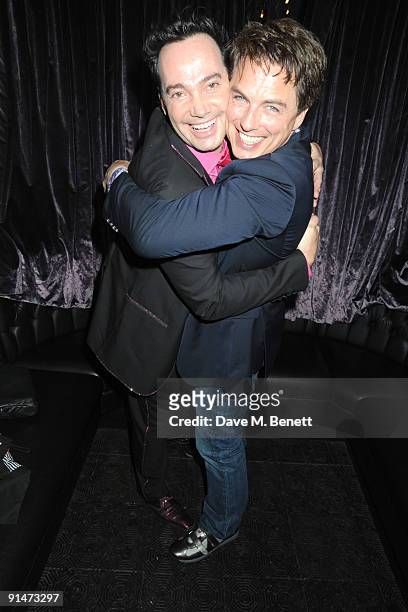 Craig Revel Horwood and John Barrowman attend the press night for La Cage Aux Folles at the Playhouse Theatre on October 5, 2009 in London, England.
