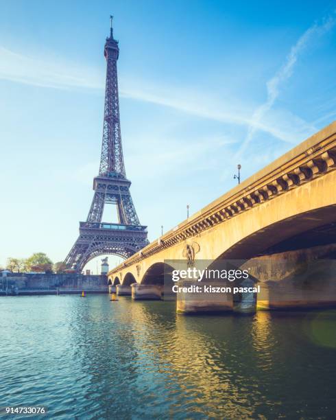 eiffel tower in paris from the seine river in day , france - river seine stock pictures, royalty-free photos & images