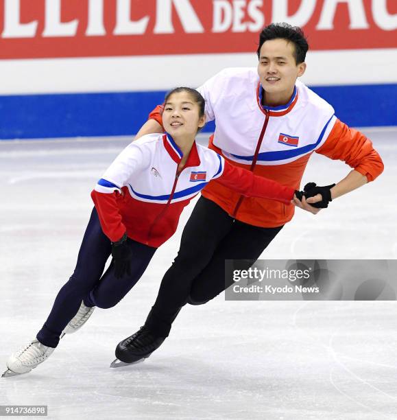 Photo taken on Jan. 22 shows North Korea figure skating pair Tae Ok Ryom and Ji Sik Kim training at the Four Continents Figure Skating Championships...