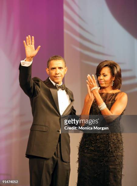 President Barack Obama and First Lady Michelle Obama attend the Congressional Black Caucus 39th Annual Legislative Conference's Phoenix Awards Dinner...