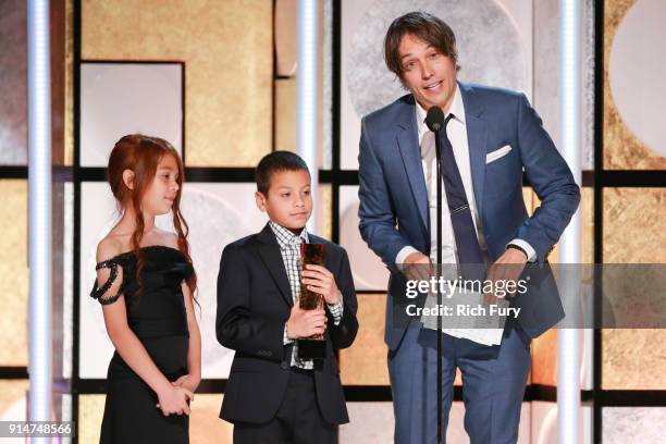 Valeria Cotto, Christopher Rivera and Sean Baker accept the award for Best Intergenerational Movie at AARP's 17th Annual Movies For Grownups Awards...