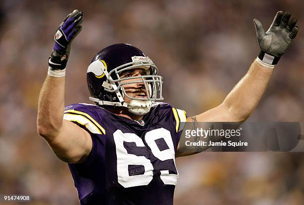 Defensive end Jared Allen of the Minnesota Vikings pumps up the crowd during the Monday Night Football game against the Green Bay Packers on October...