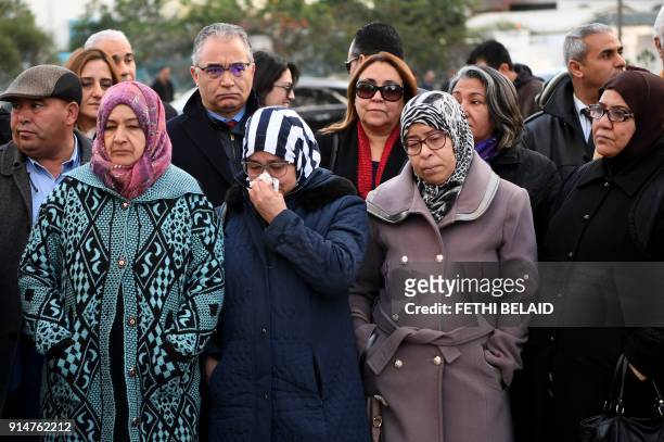 Tunisians attend a gathering in the capital Tunis to mark the fifth anniversary of the death of Tunisian opposition figure Chokri Belaid, on February...