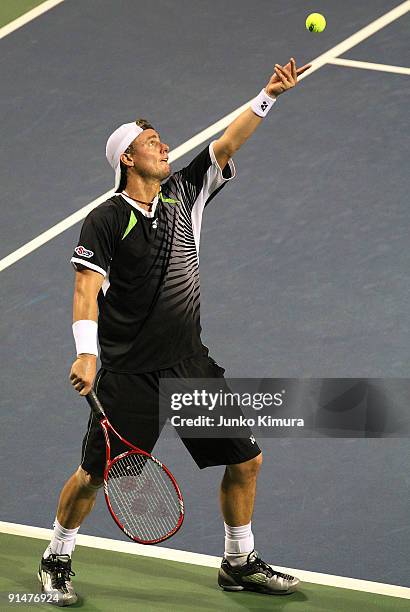 Lleyton Hewitt of Australia serves in his match against Tatsuma Ito of Japan during day two of the Rakuten Open Tennis tournament at Ariake Colosseum...