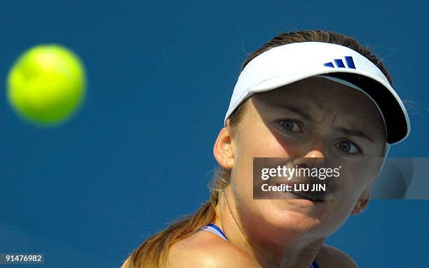 Daniela Hantuchova of Slovakia eyes a return against Carla Suarez Navarro of Spain during their match at the China Open tennis tournament at the...