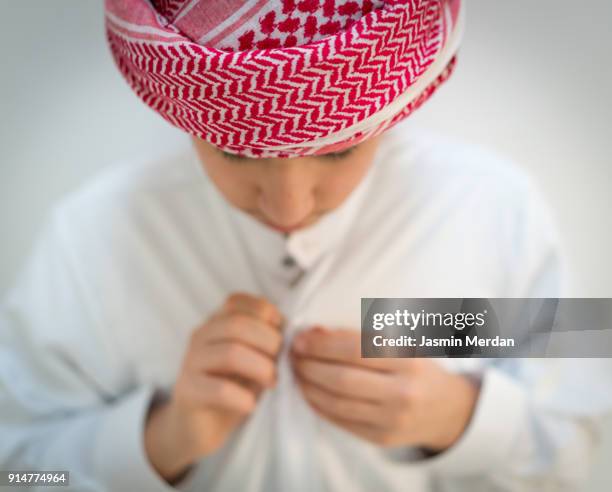 arabic boy closeup wearing traditional clothes - kaffiyeh bildbanksfoton och bilder