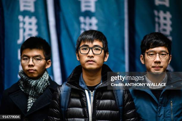 Hong Kong's leading democracy activists Joshua Wong, Nathan Law and Alex Chow arrive outside the Court of Final Appeal in Hong Kong on February 6,...