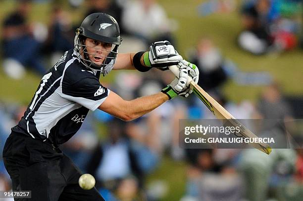 New Zealand batsman Martin Guptill plays a shot on October 5, 2009 during the ICC Champions Trophy final match between New Zealand and Australia at...