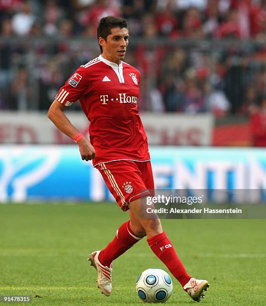 Jose Ernesto Sosa of Muenchen runs with the ball during the Bundesliga match between FC Bayern Muenchen and 1. FC Koeln at Allianz Arena on October...