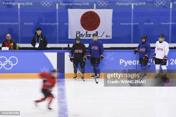 Japan's women ice hockey national team attend a training session at the Kwandong Hockey Centre's practice facility before the PyeongChang 2018 Winter...