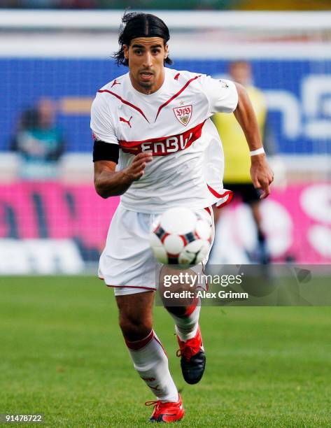 Sami Khedira of Stuttgart runs with the ball during the Bundesliga match between VfB Stuttgart and SV Werder Bremen at the Mercedes-Benz Arena on...