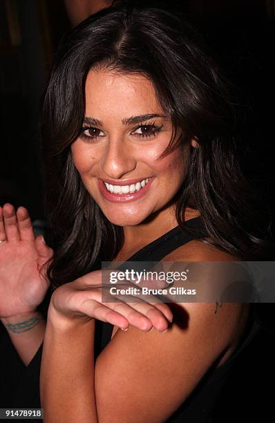 Lea Michele poses as she attends the hit rock musical "Rock of Ages" on Broadway at The Brooks Atkinson Theater on October 6, 2009 in New York, New...