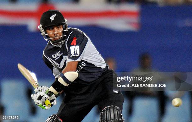 New Zealand's cricketer Jeetan Patel lines up a shot during the ICC Champions Trophy final between Australia and New Zealand at SuperSport Park in...