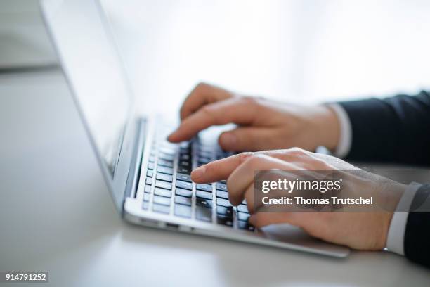 Hands typing on a computer keyboard on February 06, 2018 in Berlin, Germany.