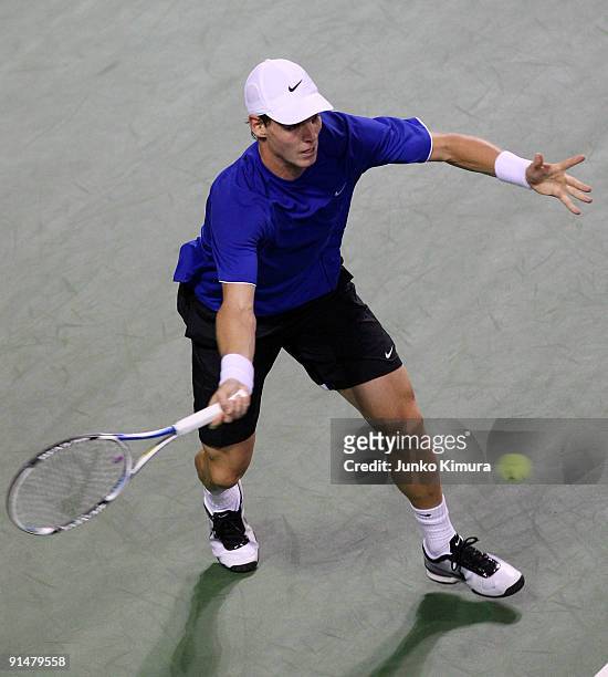 Tomas Berdych of the Czech Republic plays a forehand in his match against Go Soeda of Japan during day two of the Rakuten Open Tennis tournament at...