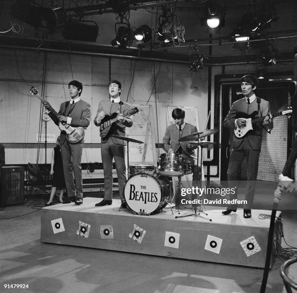 English rock and pop group The Beatles, from left Paul McCartney, John Lennon , Ringo Starr and George Harrison , on stage during rehearsals for the...