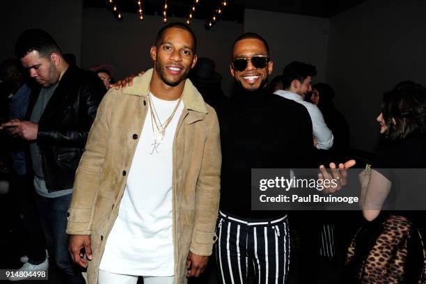 Victor Cruz and Eric West attend the Todd Snyder February 2018 fashion show during New York Fashion Week: Mens' at Pier 59 Studios on February 5,...