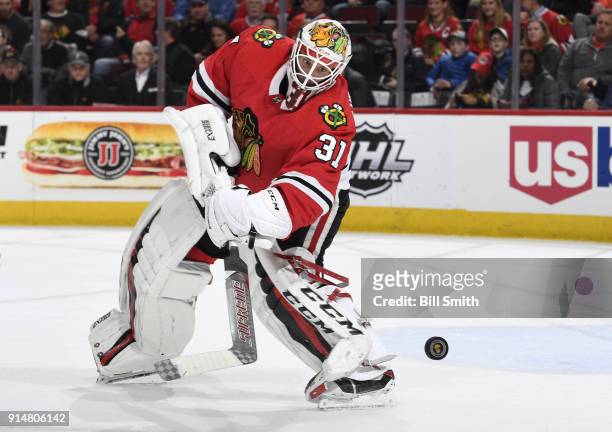 Goalie Anton Forsberg of the Chicago Blackhawks watches the puck in the second period against the Minnesota Wild at the United Center on January 10,...