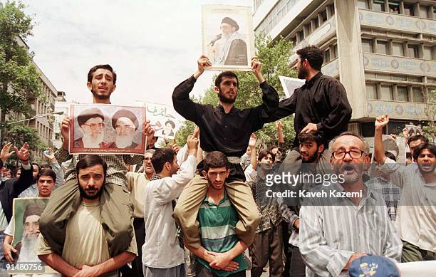 Men on a pro-leader demonstration in Tehran, in support of Ayatollah Ali Khamenei, after the city's student riots, 14th July 1999. The riots caused...