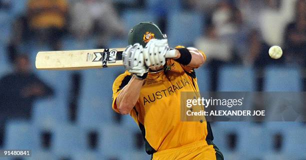 Australian batsman Shane Watson avoids a bouncer from England cricketer Graham Onions during the ICC Champions Trophy 1st semi final between England...