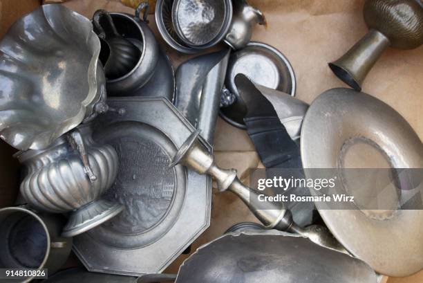 overhead view of second-hand metal objects - metallartikel stock-fotos und bilder