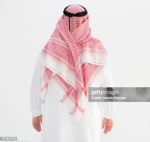 modern young arabian man - rear view - kaffiyeh stock pictures, royalty-free photos & images