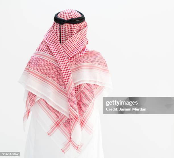 modern young arabian man - rear view - dish dash stock pictures, royalty-free photos & images