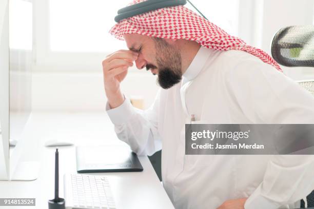 arabic businessman having stressful moment - ksa people stock pictures, royalty-free photos & images
