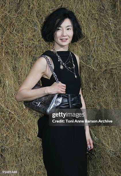 Maggie Cheung attends the Chanel Pret a Porter show as part of the Paris Womenswear Fashion Week Spring/Summer 2010 at the Grand Palais on October 6,...