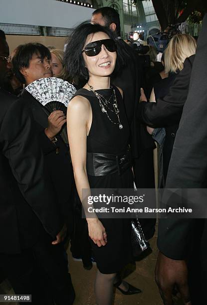 Maggie Cheung attends the Chanel Pret a Porter show as part of the Paris Womenswear Fashion Week Spring/Summer 2010 at the Grand Palais on October 6,...