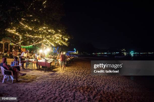 dinner on the beach, koh tao, thailand - koh tao thailand stock pictures, royalty-free photos & images