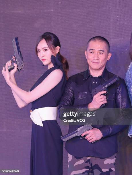 Actress Tiffany Tang and actor Tony Leung Chiu-wai attend the press conference of film 'Europe Raiders' on February 6, 2018 in Beijing, China.