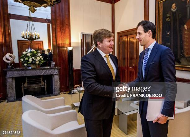 King Willem-Alexander of The Netherlands shakes hands with Dutch Minister of Finance Wopke Hoekstra during a meeting at the Royal Palace Noordeinde...