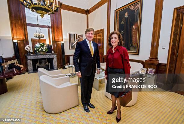 King Willem-Alexander of The Netherlands shakes hands with Dutch Minister of Education, Culture and Science Ingrid van Engelshoven during a meeting...