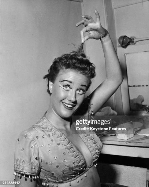 British actress and singer Elizabeth Larner, who cut her hair short in order to wear a dark wig for her role in the musical 'Kismet', April 1956.