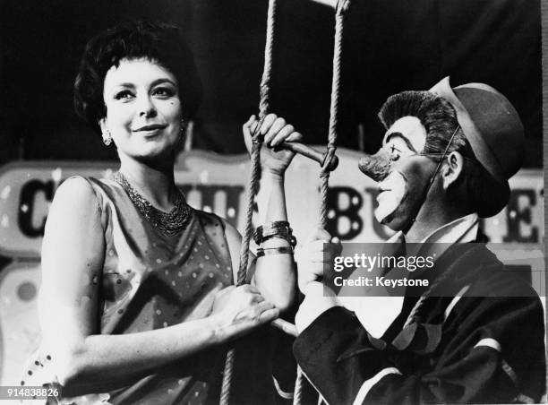 Danish comic actor Buster Larsen and actress Helle Virkner , wife of Danish Foreign Minister Jens Otto Krag, star in the film 'Cirkus Buster', 20th...