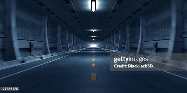 road tunnel - städtischer verkehrsweg stock-fotos und bilder