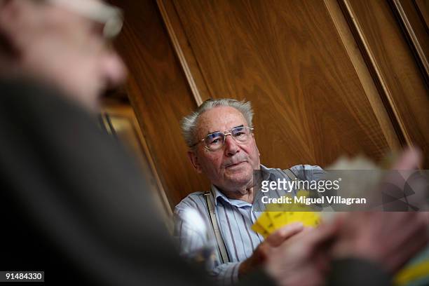 Pensioner Albin Marty plays the Swiss card game 'Jassen' at a tavern next to the railway station on October 6, 2009 in Pfaeffikon, Switzerland. Due...