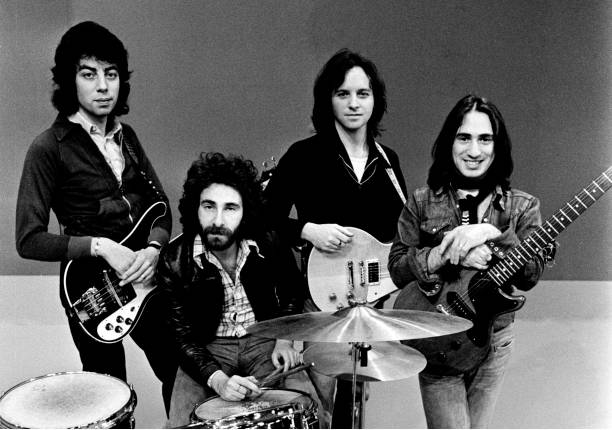 10cc perform live on Top Pop TV show at Hilversum Studios in Holland in 1975. L-R Graham Gouldman, Kevin Godley, Eric Stewart, Lol Creme