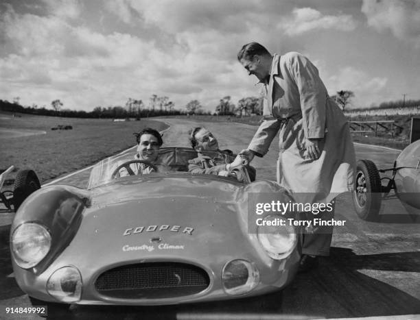 The Honourable Gerald Lascelles shakes hands with Technical Sergeant Henry Klyner of the US Army, who is taking lessons from John Cooper at the new...