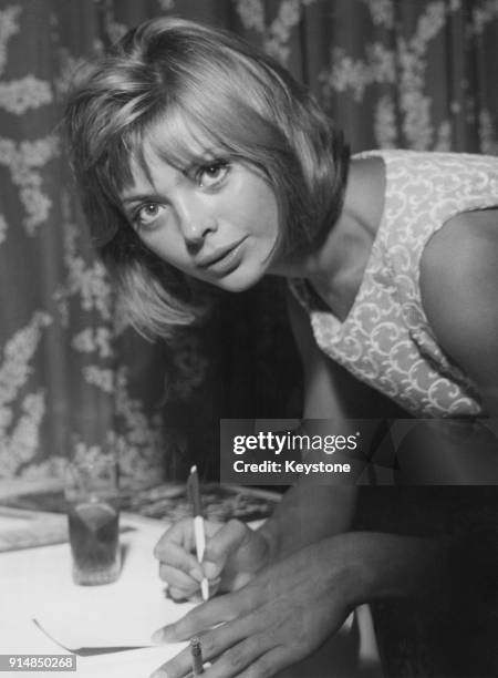Polish actress Barbara Lass , aka Barbara Kwiatkowska-Lass, signs a contract with Italian movie producers in Rome, Italy, 11th September 1961.