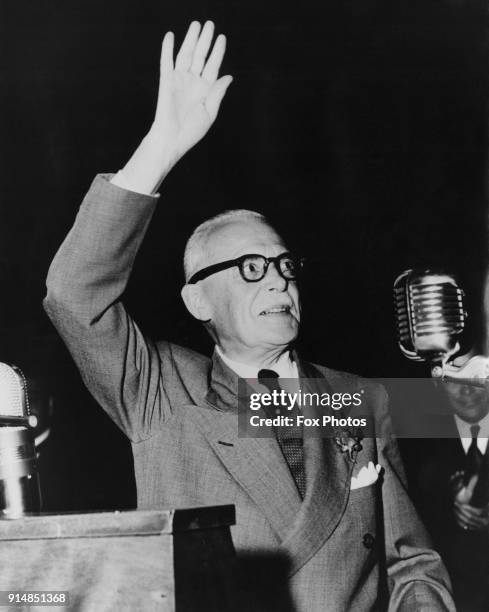 Canadian Prime Minister Louis St. Laurent waves to supporters at a Liberal rally in Maple Leaf Gardens, Toronto, during his re-election campaign,...