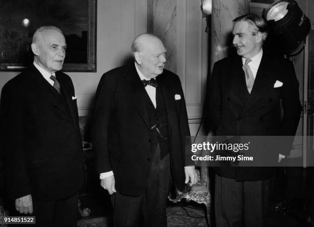 From left to right, Canadian Prime Minister Louis St. Laurent , British Prime Minister Winston Churchill and British Foreign Secretary Anthony Eden...