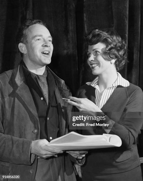 English actor Tony Britton with actress Sarah Lawson during rehearsals for the BBC television play 'You Are There: The Ordeal of Christabel...