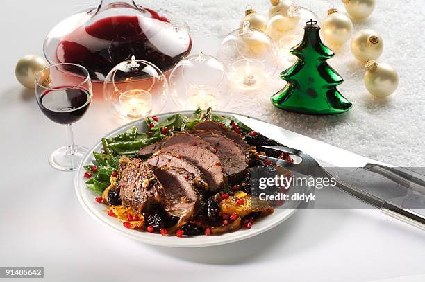 roasted christmas lamb - roast beef dinner stock pictures, royalty-free photos & images