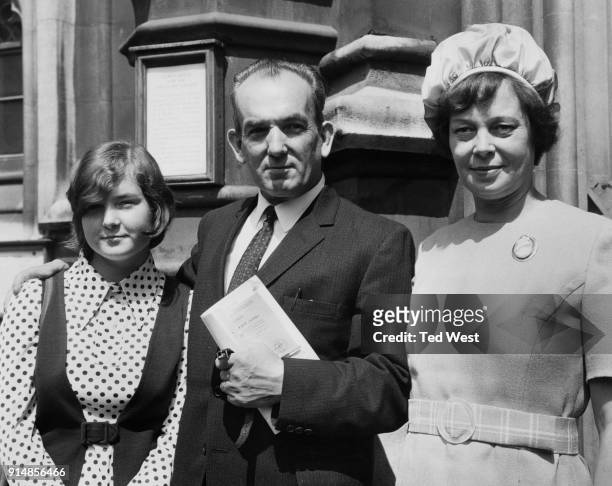 British politician Wallace Lawler , the new MP for Birmingham, Ladywood, arrives at the House of Commons with his wife Catherine and daughter Anne,...