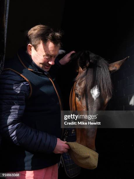 Nicky Henderson poses for a photo with top chaser Altior at his Lambourne stables, ahead of the 2018 Betfair Exchange Chase at Newbury Racecourse, on...