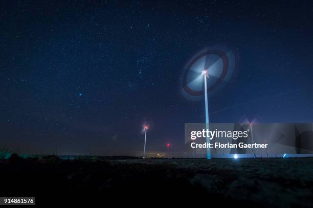 This long exposure shows rotating wind turbines at night on February 05, 2018 in Cottbus, Deutschland.