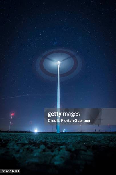 This long exposure shows rotating wind turbines at night on February 05, 2018 in Cottbus, Deutschland.